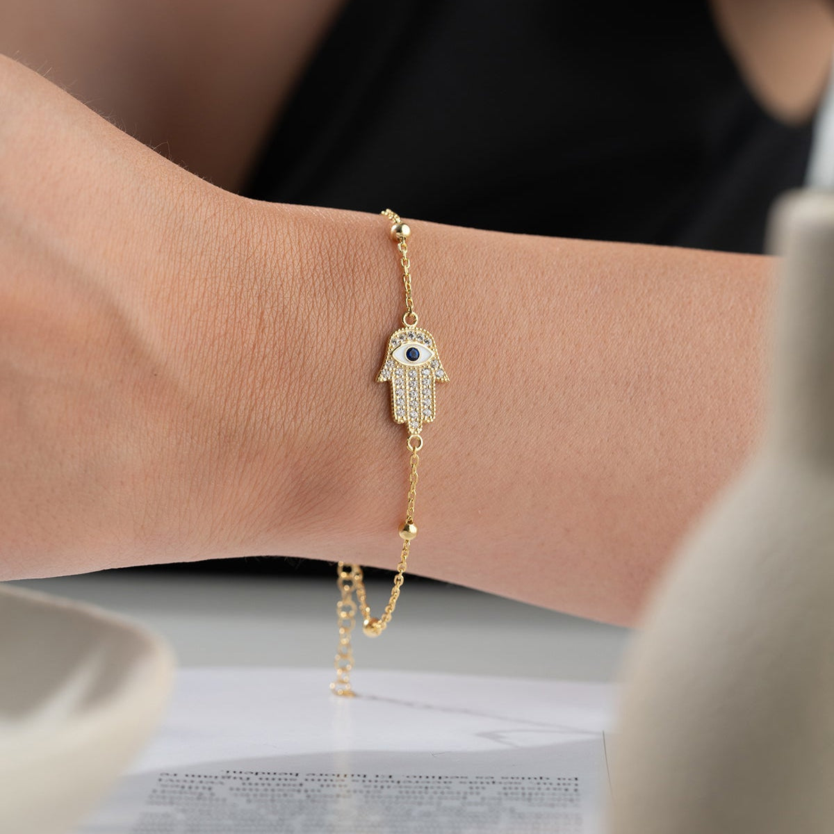 Vergoldetes Armband mit Hamsa-Hand & Auge