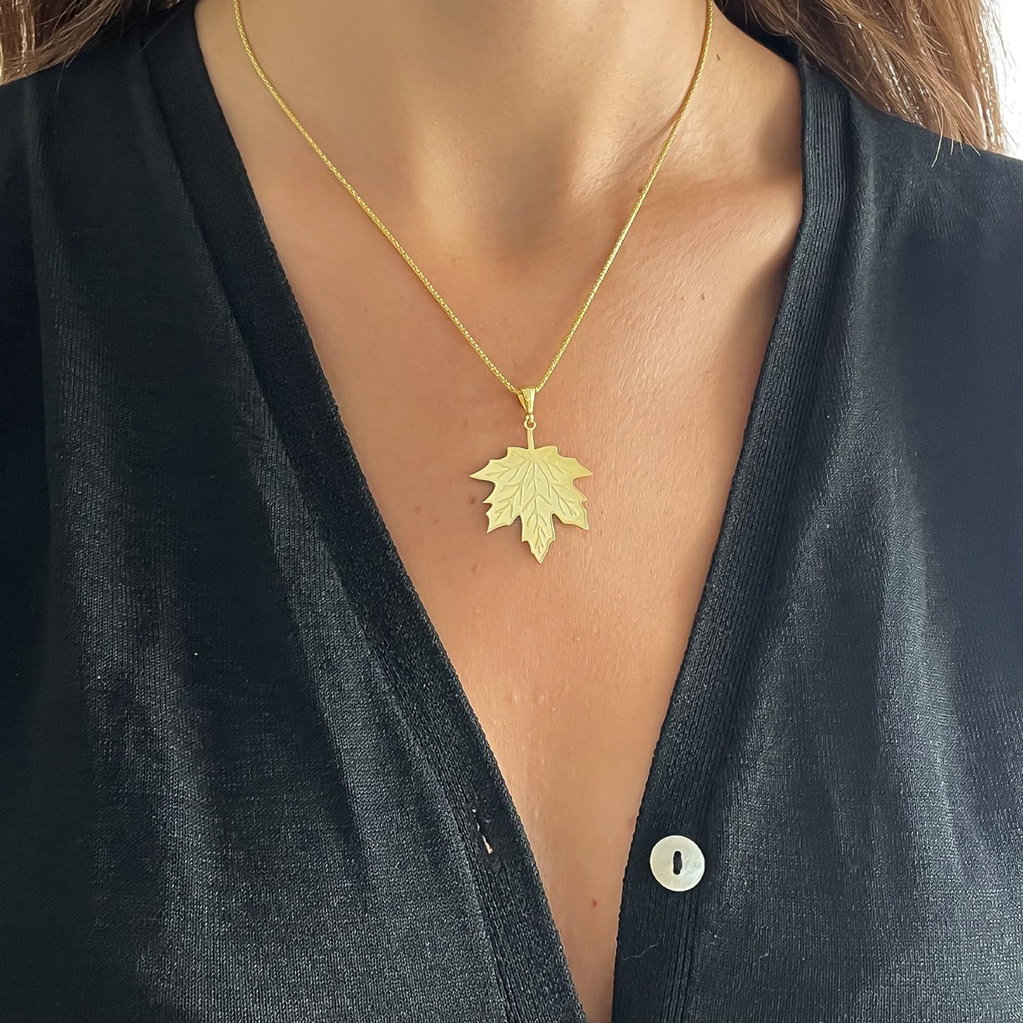 Zilveren ketting met hanger blad