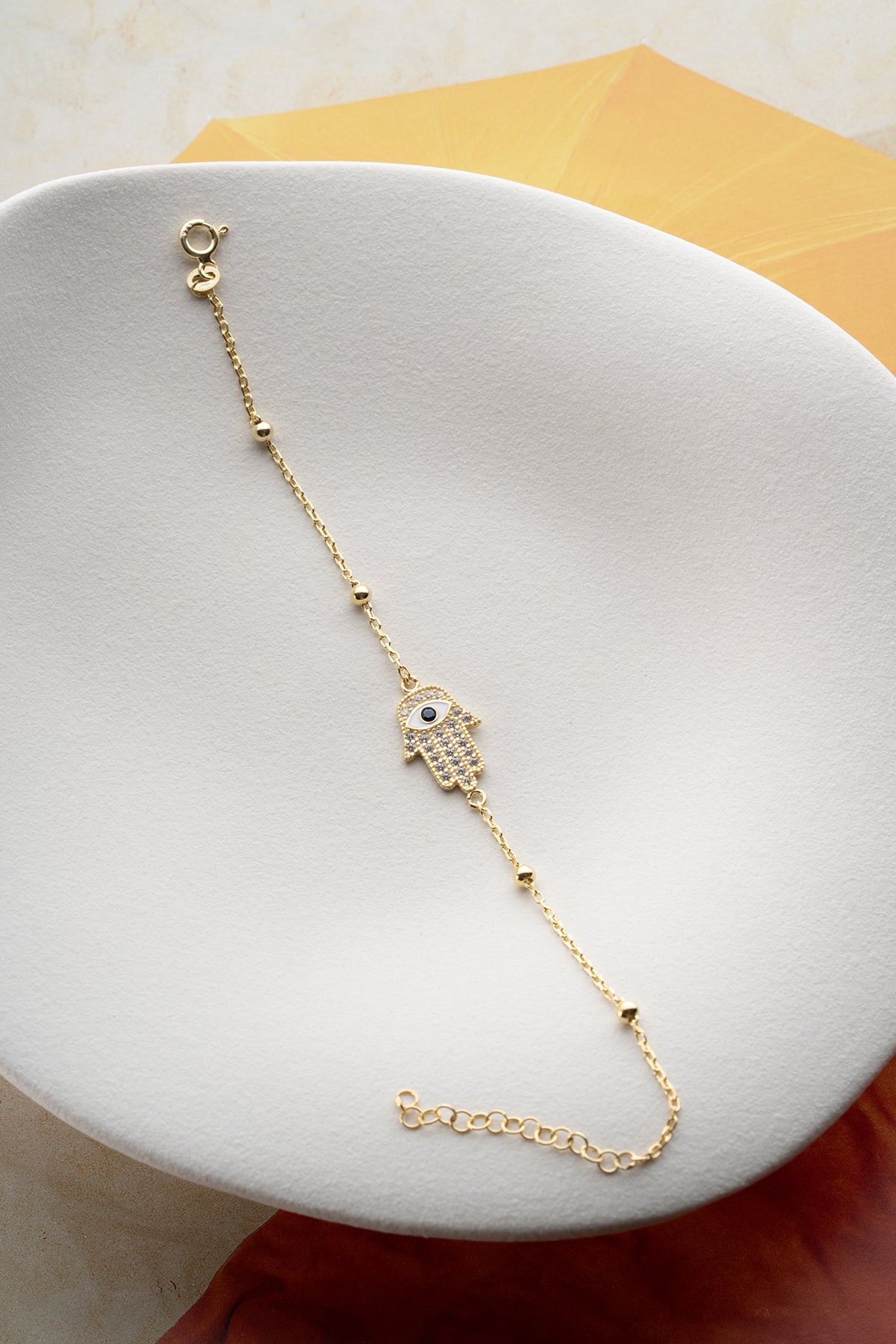 Vergoldetes Armband mit Hamsa-Hand & Auge